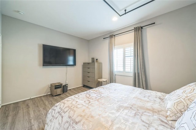 33312 Hitching Post Dr, Winchester, CA 92596 - bedroom with wood finished floors, recessed lighting, and baseboards