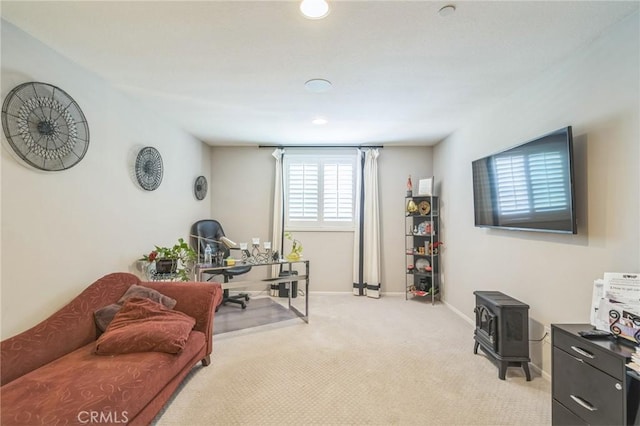 33312 Hitching Post Dr, Winchester, CA 92596 - office with light carpet, a wood stove, and baseboards