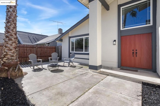 view of patio featuring a fire pit