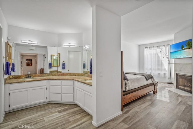 bathroom featuring hardwood / wood-style floors and vanity