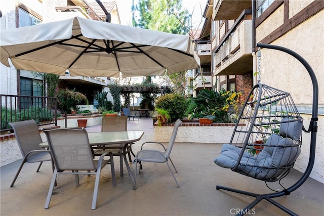 view of patio / terrace featuring a pergola