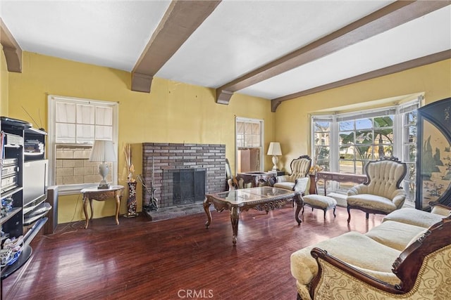 living room with a brick fireplace, dark hardwood / wood-style flooring, and beamed ceiling