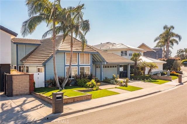 view of front of property featuring a garage