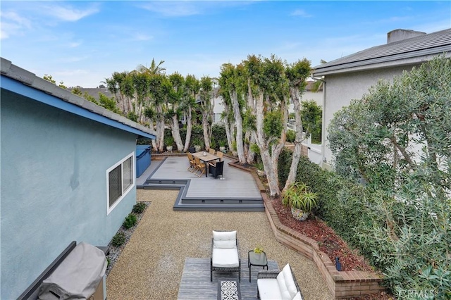 view of yard with a deck