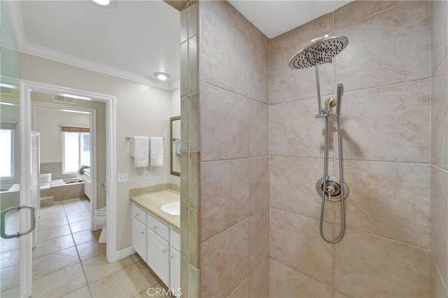 full bathroom featuring crown molding, vanity, tile patterned floors, shower with separate bathtub, and toilet