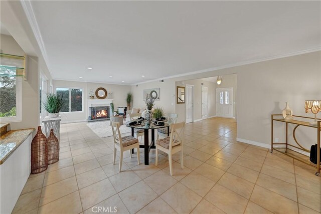 tiled dining room with ornamental molding