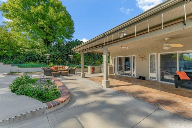 view of patio / terrace featuring ceiling fan and an outdoor hangout area