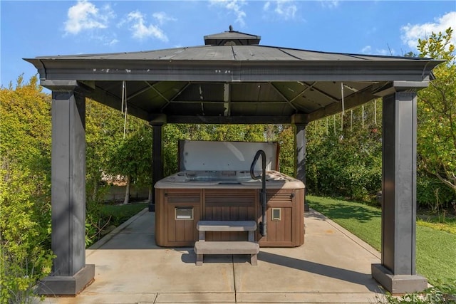 view of patio with a gazebo and a hot tub