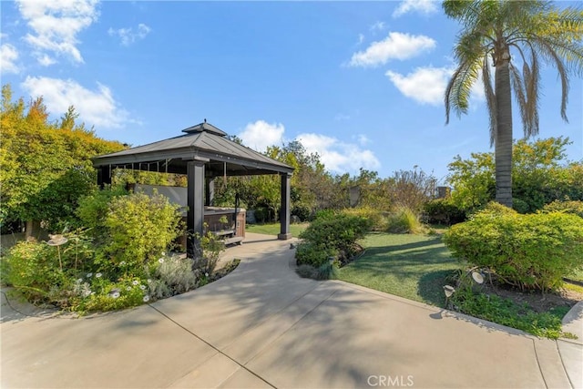 view of property's community featuring a gazebo and a yard