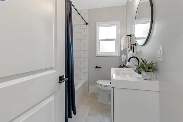 full bathroom with shower / bathtub combination with curtain, tile patterned floors, vanity, and toilet