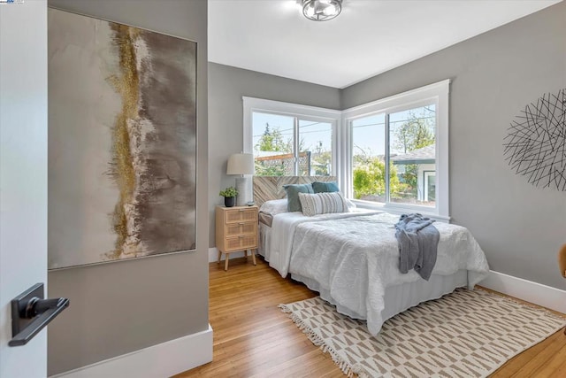 bedroom featuring hardwood / wood-style floors