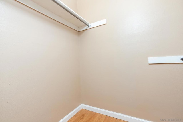 walk in closet featuring wood-type flooring