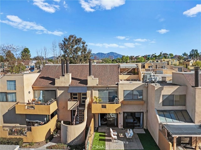 exterior space featuring a mountain view