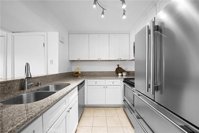 kitchen with white cabinetry, appliances with stainless steel finishes, and sink