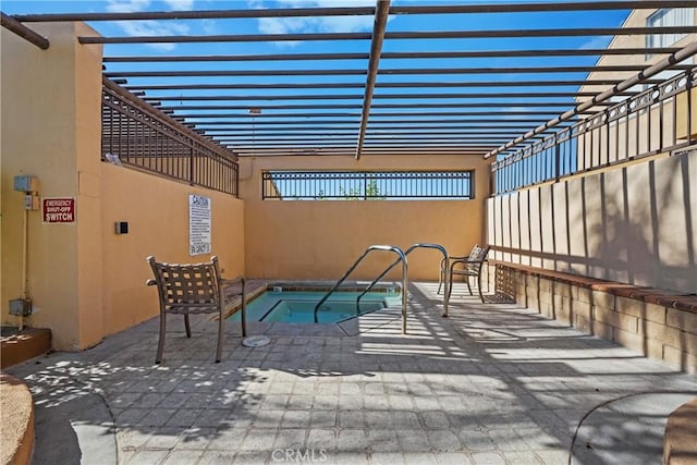 view of pool featuring a patio, a community hot tub, and a pergola