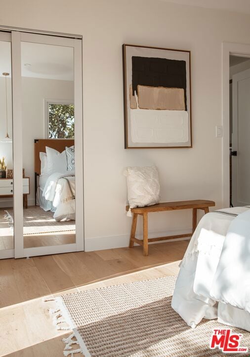 bedroom featuring hardwood / wood-style floors