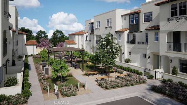 view of property's community featuring a pergola