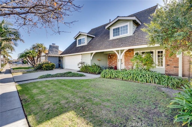 cape cod home with a front yard