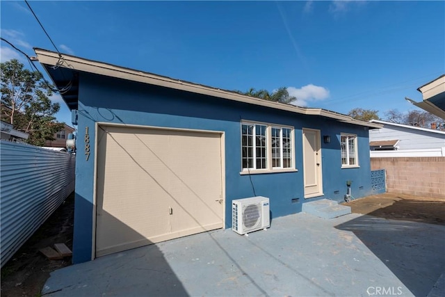 exterior space with ac unit