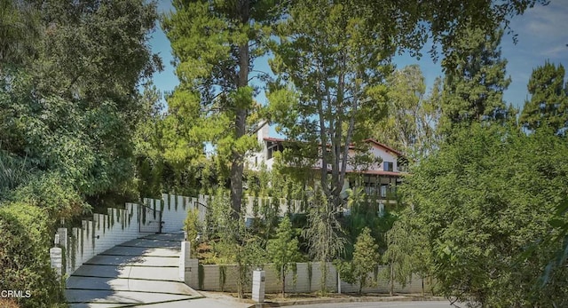 view of home's community with a boat dock