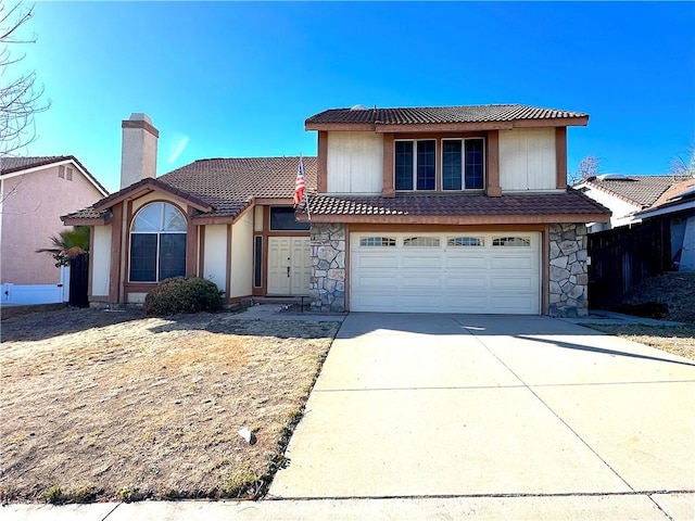 view of front of property with a garage