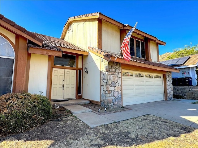 view of front of house with a garage