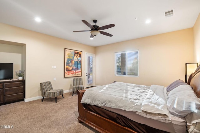 bedroom featuring access to outside, ceiling fan, and light carpet