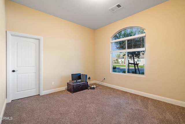 unfurnished room featuring carpet floors