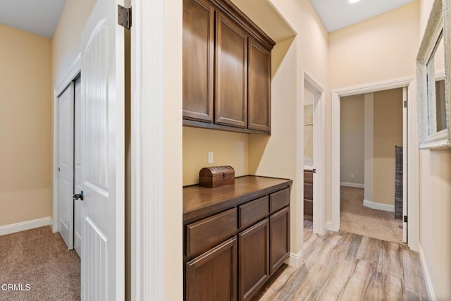 hall with light wood-type flooring