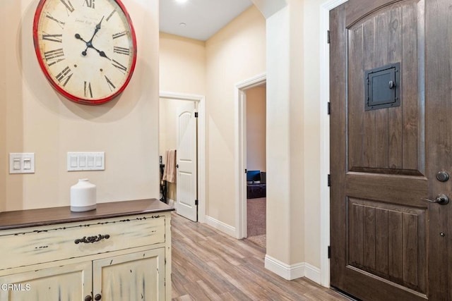 hall featuring light wood-type flooring