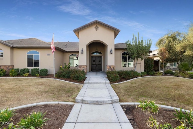 view of front facade with a front yard