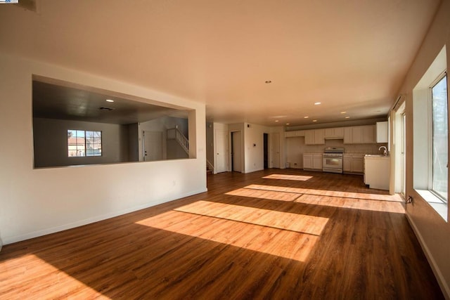 unfurnished living room with light hardwood / wood-style flooring