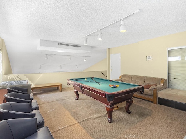 game room with pool table, a textured ceiling, and carpet floors