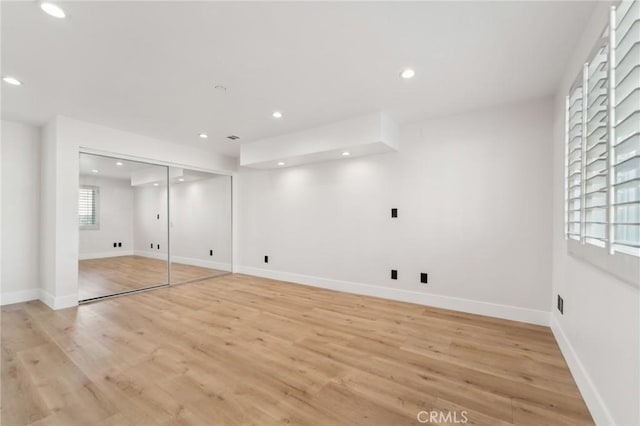 1536 Wollacott St, Redondo Beach, CA 90278 - below grade area featuring light wood finished floors, recessed lighting, and baseboards