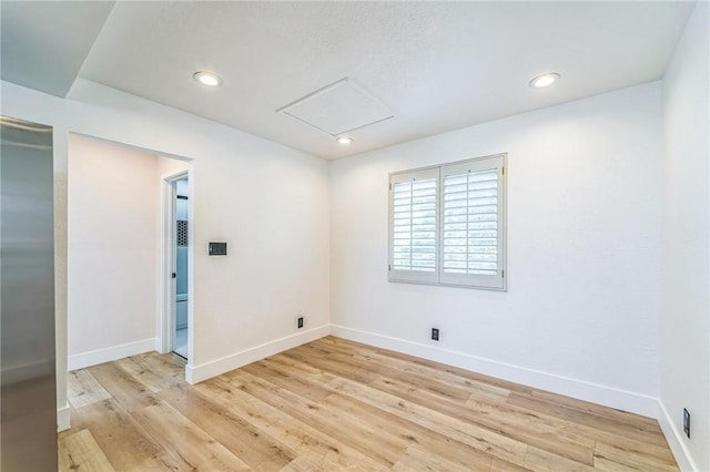 1536 Wollacott St, Redondo Beach, CA 90278 - unfurnished room with light wood-style flooring, baseboards, and recessed lighting