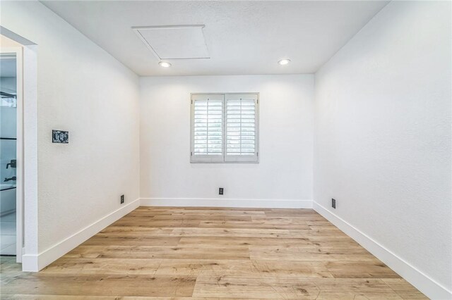 1536 Wollacott St, Redondo Beach, CA 90278 - spare room with light wood-style floors, attic access, baseboards, and recessed lighting