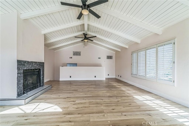 1536 Wollacott St, Redondo Beach, CA 90278 - unfurnished living room with ceiling fan, baseboards, a fireplace with raised hearth, wood finished floors, and vaulted ceiling