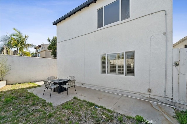 1536 Wollacott St, Redondo Beach, CA 90278 - back of property featuring fence, a patio area, and stucco siding