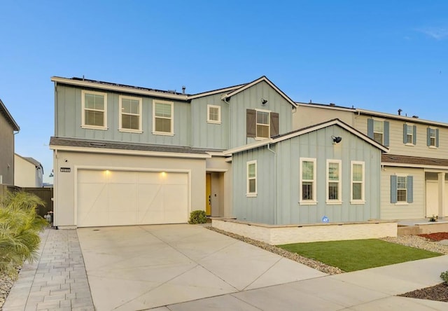 view of front of home with a garage