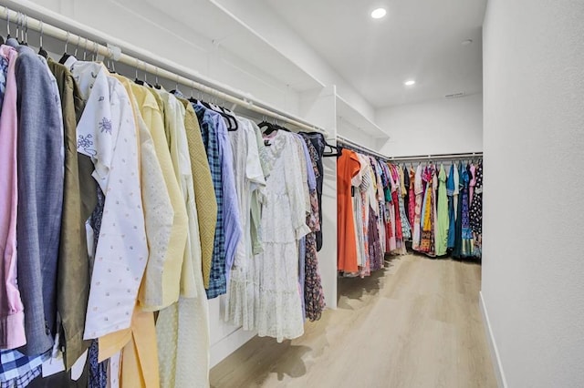 spacious closet with light wood-type flooring