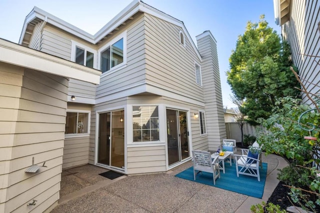 rear view of house with a patio area