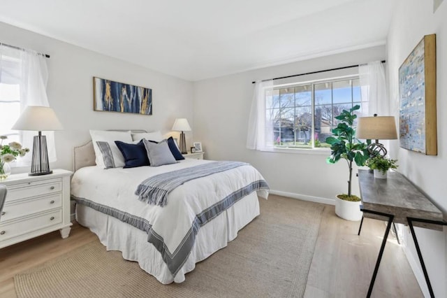 bedroom featuring light hardwood / wood-style floors