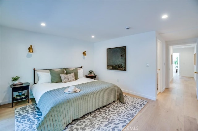 bedroom featuring light hardwood / wood-style flooring