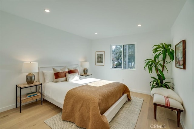 bedroom featuring light hardwood / wood-style floors