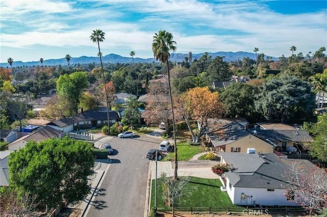 drone / aerial view featuring a mountain view