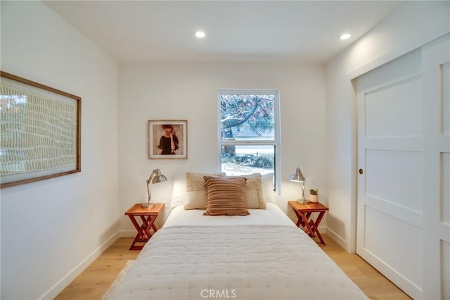 bedroom featuring light hardwood / wood-style floors