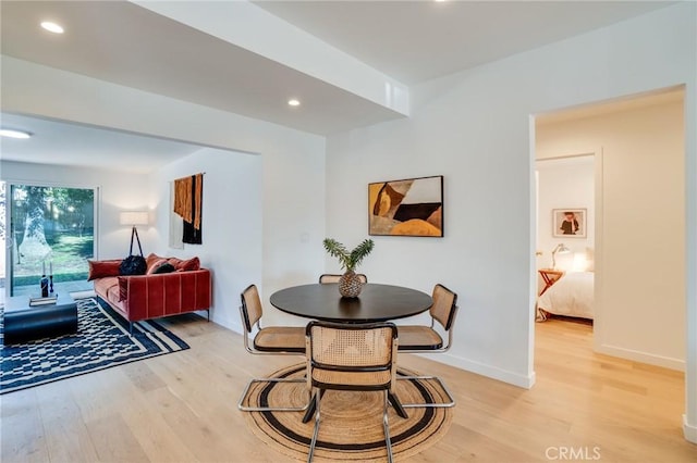 dining space featuring light hardwood / wood-style flooring