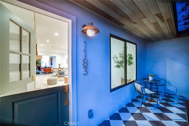 doorway featuring wood ceiling