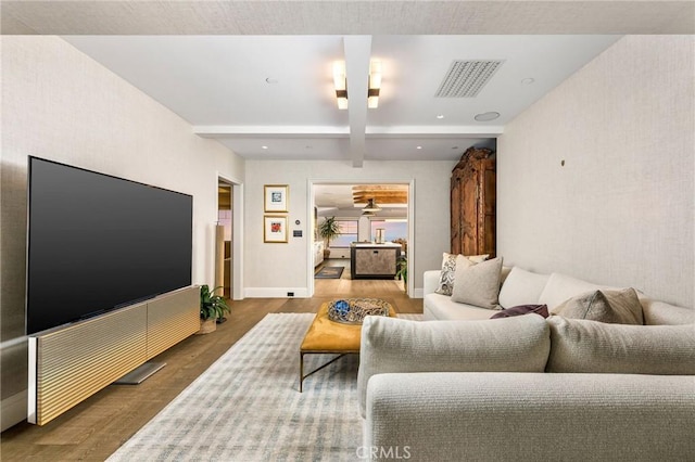 2040 Ocean Way, Laguna Beach, CA 92651 - living room with baseboards, beam ceiling, wood finished floors, and visible vents