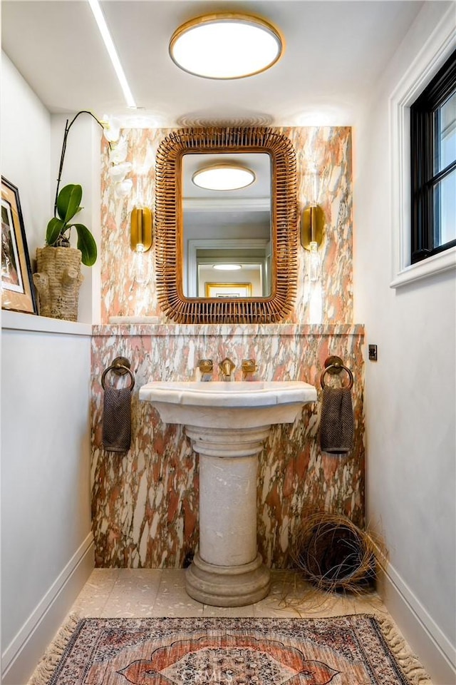 bathroom with tile patterned floors and sink